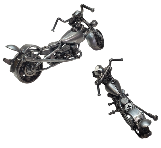 Each piece is hand-crafted using sprockets, chains, nuts, bolts, washers, springs, and bearing wheels, making it a truly one-of-a-kind present. For exact measurements, check out the photo. You can find these METAL artwork pieces at our Smyrna store, located just minutes from Nashville, TN.

Size Approx. 4" tall x 7 1/2" long x 3 wide
Imported