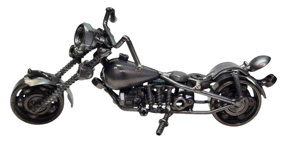 Each piece is hand-crafted using sprockets, chains, nuts, bolts, washers, springs, and bearing wheels, making it a truly one-of-a-kind present. For exact measurements, check out the photo. You can find these METAL artwork pieces at our Smyrna store, located just minutes from Nashville, TN.

Size Approx. 4" tall x 7 1/2" long x 3 wide
Imported