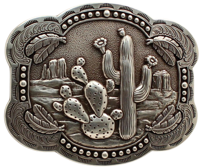 Take a trip to the desert with our "Strawflower Feathers" Belt Buckle! Featuring a design of cacti, mesas, and feathers, this antique silver-colored piece measures 3" tall by 4" wide and can fit belts up to 1 1/2" wide. You can purchase it both in our retail shop located in Smyrna, TN near Nashville and online.