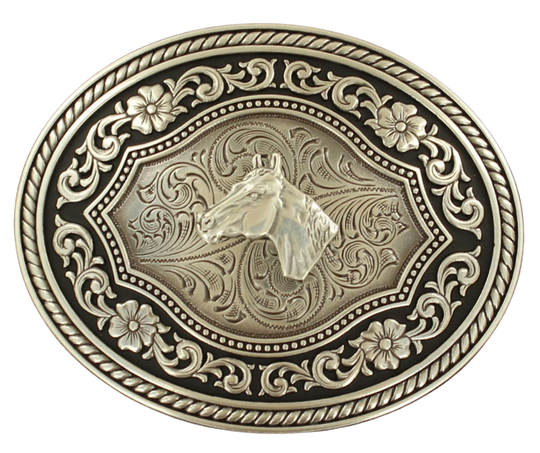 This is an Western-style buckle with an oval shape and a unique design featuring a rope border and a framed Horsehead in the center. The antiqued coloring and black scroll design add a touch of character to this piece. Measuring approximately 3" tall and 4" wide, it can accommodate belts up to 1 1/2" wide. This buckle can be found at our retail shop in Smyrna, TN, just outside Nashville, and is also available for purchase on our online store.