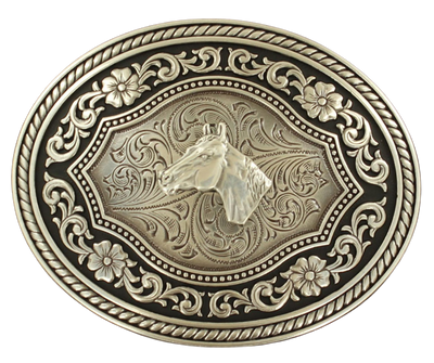 This is an Western-style buckle with an oval shape and a unique design featuring a rope border and a framed Horsehead in the center. The antiqued coloring and black scroll design add a touch of character to this piece. Measuring approximately 3" tall and 4" wide, it can accommodate belts up to 1 1/2" wide. This buckle can be found at our retail shop in Smyrna, TN, just outside Nashville, and is also available for purchase on our online store.