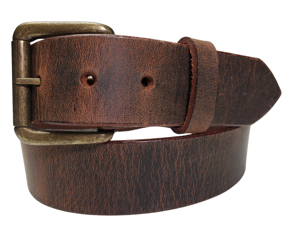 The Micromanager Leather Belt brings casual relaxation to your number-crunching workdays. Crafted from a single piece of 1/8" top grain leather, this belt features handy snaps for swapping buckles whenever the mood strikes. Watch our sizing video to nail the perfect fit! Available at our Smyrna shop, just a quick rideshare from Nashville hotspots – because even spreadsheet wizards deserve stylish accessories.