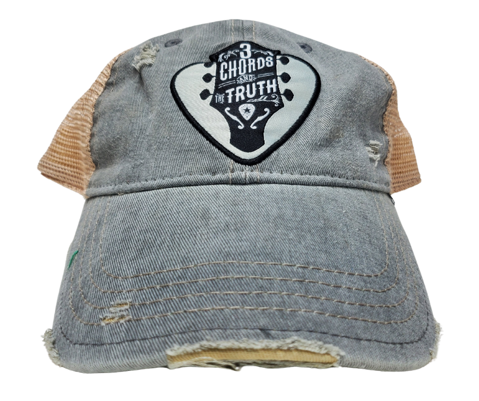 The 3 Chords and Truth has guitar headstock graphic in a pick shaped patch. It's Super soft with rips and tears for that well worn look. Faded blue twill front, cream color mesh back with snap back for adjustment. Available online and in our retail shop in Smyrna, TN.