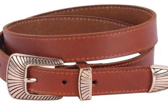 Upgrade your style with The Mojave Western Belt - an ideal choice for anyone who loves the bohemian look. With a one-of-a-kind 3 piece Gold tone buckle set and premium leather straps, this set allows for limitless outfit combinations. Whether you wear it on your waist or hips, it effortlessly brings a fun and carefree vibe to any ensemble. Available now at our Smyrna, TN location near Murfreesboro. Imported