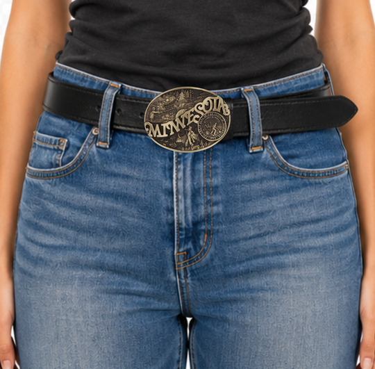 Celebrate Minnesota State with this buckle highlighting fly fishing, the golden era of logging, and the great state seal! Brass plate over a solid cast metal alloy is antiqued and buffed to highlight the details.

Fits 1 1/2" belts and is approx. 3" tall x 4" across. Available at our shop just outside Nashville in Smyrna, TN. Made by Montana Silversmiths.