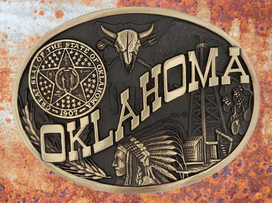 Large lettering spelling out Oklahoma stretches boldly across, surrounded by a set of antiqued figures in celebration of Oklahoma heritage including a Native Chief portrait, oil drilling, wheat, ranching and the state seal. Our cast belt buckles are acid washed to add the dark antiqued patina and hand buffed to bring out the highlights and details. Standard 1.5 inch belt swivel. Get yours at our local Smyrna ,TN shop.