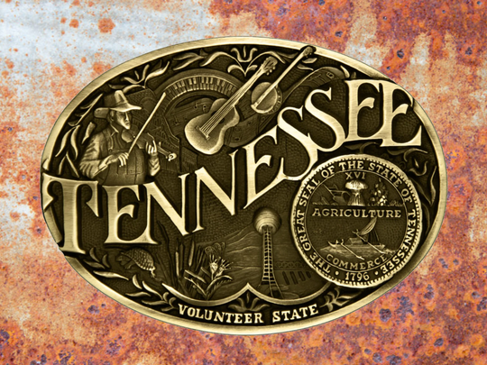 Antiqued brass colored Attitude buckle Tennessee state and symbols. Standard 1.5 belt swivel. Available online and in our shop in Smyrna, TN, just outside of Nashvillle.