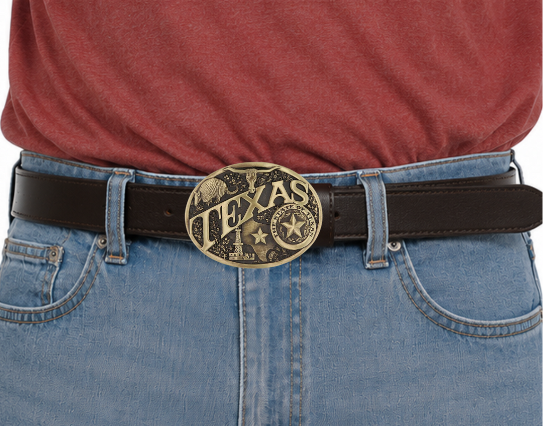 Large lettering spelling out TEXAS stretches boldly across, surrounded by a set of antiqued figures in celebration of Texas heritage including a longhorn head, armadillo, oil well, the state of Texas and the Lone Star seal. Our cast belt buckles are acid washed to add the dark antiqued patina and hand buffed to bring out the highlights and details. Standard 1.5 inch belt swivel. Get yours at our local Smyrna ,TN shop.