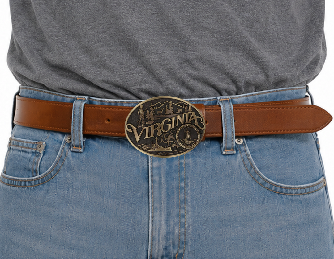 Celebrate Virginia State with this buckle highlighting a frontiersman scoping a land of plenty and a navel ship at sea motifs including the state seal!

Fits 1 1/2" belts and is approx. 3" tall x 4" across. Available at our shop just outside Nashville in Smyrna, TN. Made by Montana Silversmiths.