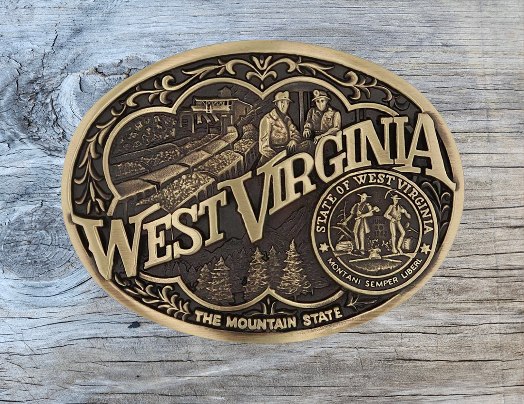 Show your West Virginia Mountain State pride by displaying this buckle highlighting mining and forestry motifs including the state seal!

Fits 1 1/2" belts and is approx. 3" tall x 4" across.&amp;nbsp;Available at our shop just outside Nashville in Smyrna, TN. Made by Montana Silversmiths.