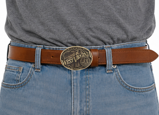 Show your West Virginia Mountain State pride by displaying this buckle highlighting mining and forestry motifs including the state seal!

Fits 1 1/2" belts and is approx. 3" tall x 4" across. Available at our shop just outside Nashville in Smyrna, TN. Made by Montana Silversmiths.