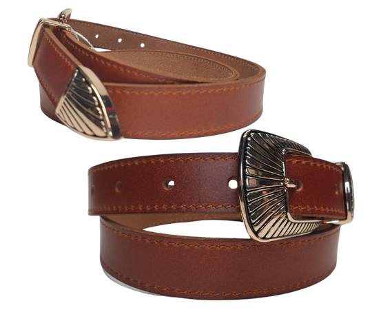 Upgrade your style with The Mojave Western Belt - an ideal choice for anyone who loves the bohemian look. With a one-of-a-kind 3 piece Gold tone buckle set and premium leather straps, this set allows for limitless outfit combinations. Whether you wear it on your waist or hips, it effortlessly brings a fun and carefree vibe to any ensemble. Available now at our Smyrna, TN location near Murfreesboro. Imported