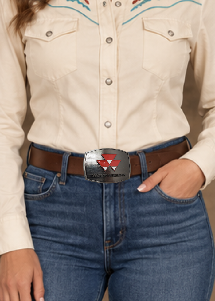Fully Licensed Massey Ferguson Belt Buckle, oval shaped with classic logo in Red and White. Size approx. 3 3/4" wide x 2 3/4" height, Fits up to 1 1/2" wide belts. Available in our shop in Smyrna, TN just outside Nashville as well as from this online store.