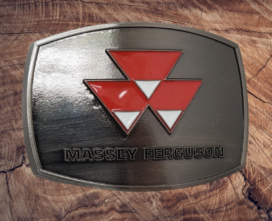 Fully Licensed Massey Ferguson Belt Buckle, oval shaped with classic logo in Red and White. Size approx. 3 3/4" wide x 2 3/4" height, Fits up to 1 1/2" wide belts. Available in our shop in Smyrna, TN just outside Nashville as well as from this online store.
