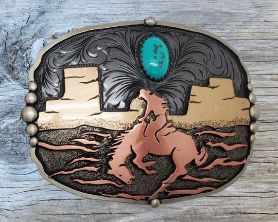 The Midnight Rider buckle is handmade from German Silver (nickel and brass alloy) or iron metal base. Our products are all handcrafted. In order to give you the quality and long lasting final product we also plate each piece with copper, nickel and silver. Available at our Smyrna, TN shop just outside of Nashville. Made in Mexico by talented metal workers.