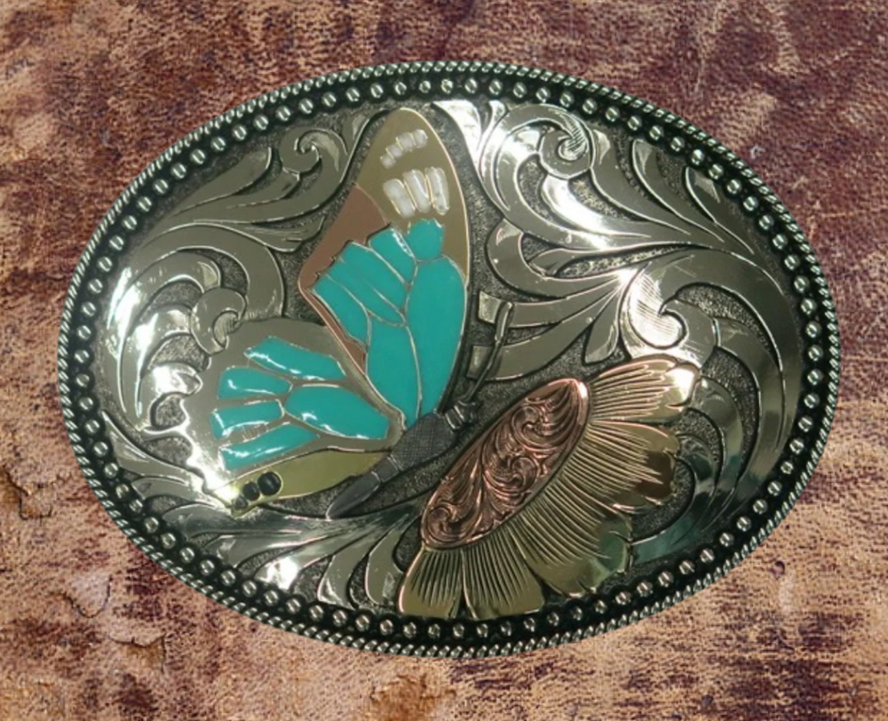 The Monarch belt buckle is made from German Silver(nickel and brass alloy)or iron metal base. These buckles have motifs made of copper, iron or brass and some are adorned with synthetic stones. In order to give you the quality and long lasting final product. Available at our Smyrna, TN shop just outside of Nashville.