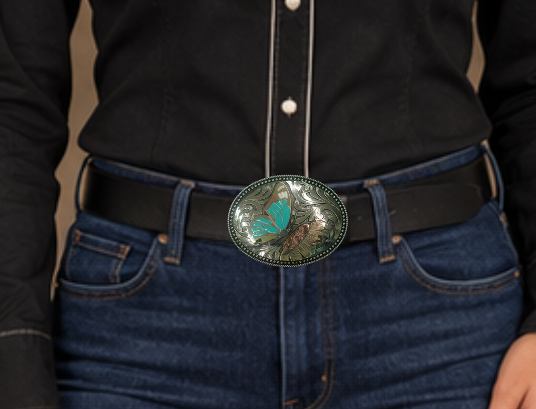 The Monarch belt buckle is made from German Silver(nickel and brass alloy)or iron metal base. These buckles have motifs made of copper, iron or brass and some are adorned with synthetic stones. In order to give you the quality and long lasting final product. Available at our Smyrna, TN shop just outside of Nashville.