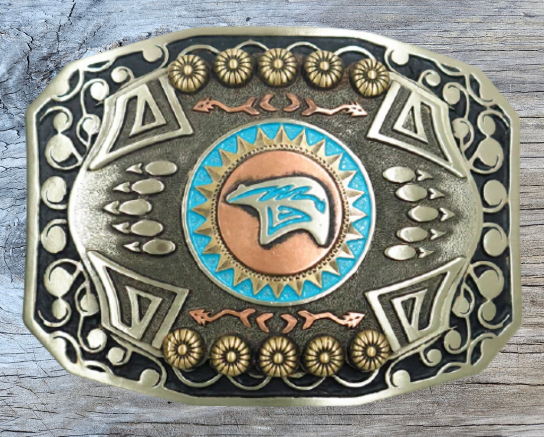 The Mukwa in Ojibwa means bear and strength. This buckle is handmade from German Silver (nickel and brass alloy) or iron metal base. Our products are all handcrafted. In order to give you the quality and long lasting final product we also plate each piece with copper, nickel and silver.&amp;nbsp; to ensure the piece&