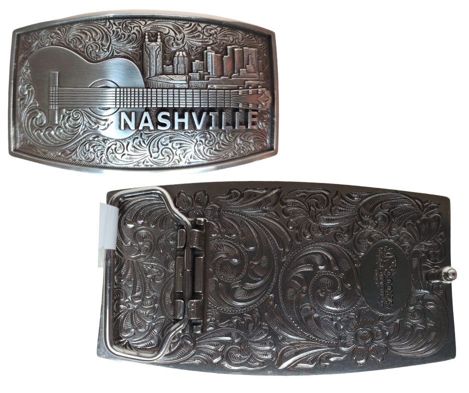 The "NASH" Buckle takes you to the beloved Nashville skyline complete with a whimsical bat tower building and an acoustic guitar. Show off your style with this 2 1/2" by 3 1/2" buckle and be inspired by the city made famous for risk-takers. Get yours online or in our Smyrna, TN shop, just outside Nashville. Dare to shine!