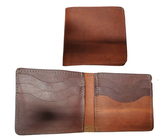 Made right here in the USA. Just leather and thread that's it. These don't have 43 pockets but are made well. If you just carry the basics these are what work for you. Just a few left. See them at our our Smyrna, TN shop just outside Nashville.