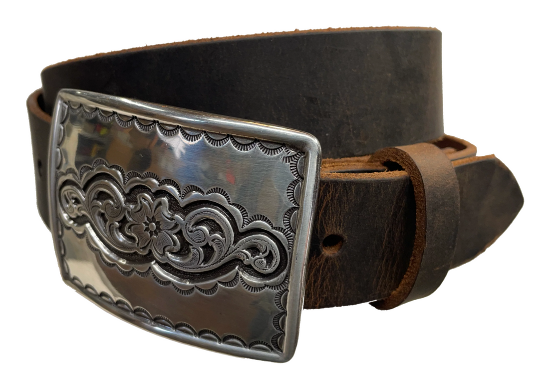 Rectangular antique silver belt buckle with western style tooling, size approx. 3" wide by 2 1/2" tall. Belt is handmade from a single strip of leather in our shop. Belt colors available are distressed brown, black, and dark brown. Buckle snaps in place for easy changing if desired.﻿ CHOOSE ONE BELT STRIP COLOR! Available online and at our shop just outside Nashville in Smyrna, TN. Main photo.