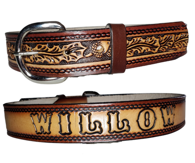 This leather belt features a gorgeous oak leaves and acorns design that stands out. The metal buckle is easily changed for convenience and comfort, making it a perfect addition to any outfit. The belt is stocked in our Smyrna, TN store outside Nashville.