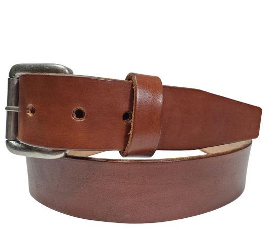 Medium Brown
Great for The Office! This real Veg-Tan leather belt starts with a hand dyed 9-10oz (1/8"ish) leather belt strip. Comes with your choice of Antique Nickle or Brass colored buckle that is snapped in for easy removal. It is handmade in our Smyrna, TN shop, which is located just outside of Nashville.