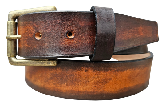 This real Veg-Tan leather belt starts with a hand dyed and finished 9-10oz (1/8"ish) leather belt strip. Great for the casual days at the Office or running round town. Comes in a 1 1/2" width and your choice of Antique Nickle or Brass colored buckle that is attached by screw post for easy removal. It is handmade in our Smyrna, TN shop, which is located just outside of Nashville.
