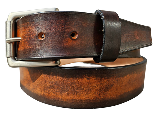 This real Veg-Tan leather belt starts with a hand dyed and finished 9-10oz (1/8"ish) leather belt strip. Great for the casual days at the Office or running round town. Comes in a 1 1/2" width and your choice of Antique Nickle or Brass colored buckle that is attached by screw post for easy removal. It is handmade in our Smyrna, TN shop, which is located just outside of Nashville.