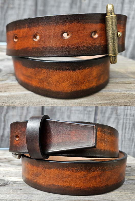 This real Veg-Tan leather belt starts with a hand dyed and finished 9-10oz (1/8"ish) leather belt strip. Great for the casual days at the Office or running round town. Comes in a 1 1/2" width and your choice of Antique Nickle or Brass colored buckle that is attached by screw post for easy removal. It is handmade in our Smyrna, TN shop, which is located just outside of Nashville.