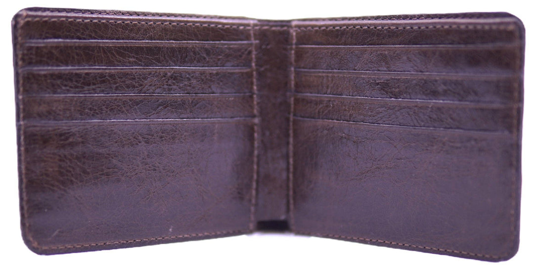If you appreciate craftmanship this USA Made Genuine Ostrich Leg Genuine Bifold will do the trick. Inside is complete with matching Leather Lining, 1 Bill Pocket, 8 Card Slots, 2 Inner Side Pockets Handmade in USA and sold in our Smyrna, TN shop not far from the gulch downtown Nashville.
