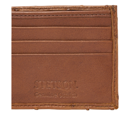 Made from authentic Cognac Ostrich leather, this bi-fold wallet blends classic western flair with bold luxury. True to Stetson’s legendary craftsmanship, it offers 6 card slots, 2 hidden pockets, and a spacious leather-lined cash compartment. Ready for you at our Smyrna, TN store, just a short drive from Nashville. Proudly made in Mexico.