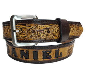 Our Outdoorsman leather belt is crafted from high-quality Veg Tan cowhide and comes in four different color options. The edges are smooth and hand finished. It has Deer, Hogs, Fish, look closely for a Racoon and a Squirrel too. Personalize your belt by adding up to 10 letters. It's 1 1/2" wide, and available in sizes 34" to 44".  The removable Brushed Nickel plated solid brass buckle is attached with two snaps. Handmade in our Smyrna, TN, USA shop, just a short trip from Nashville.