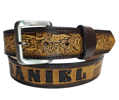 Our Outdoorsman leather belt is crafted from high-quality Veg Tan cowhide and comes in four different color options. The edges are smooth and hand finished. It has Deer, Hogs, Fish, look closely for a Racoon and a Squirrel too. Personalize your belt by adding up to 10 letters. It's 1 1/2" wide, and available in sizes 34" to 44".  The removable Brushed Nickel plated solid brass buckle is attached with two snaps. Handmade in our Smyrna, TN, USA shop, just a short trip from Nashville.
