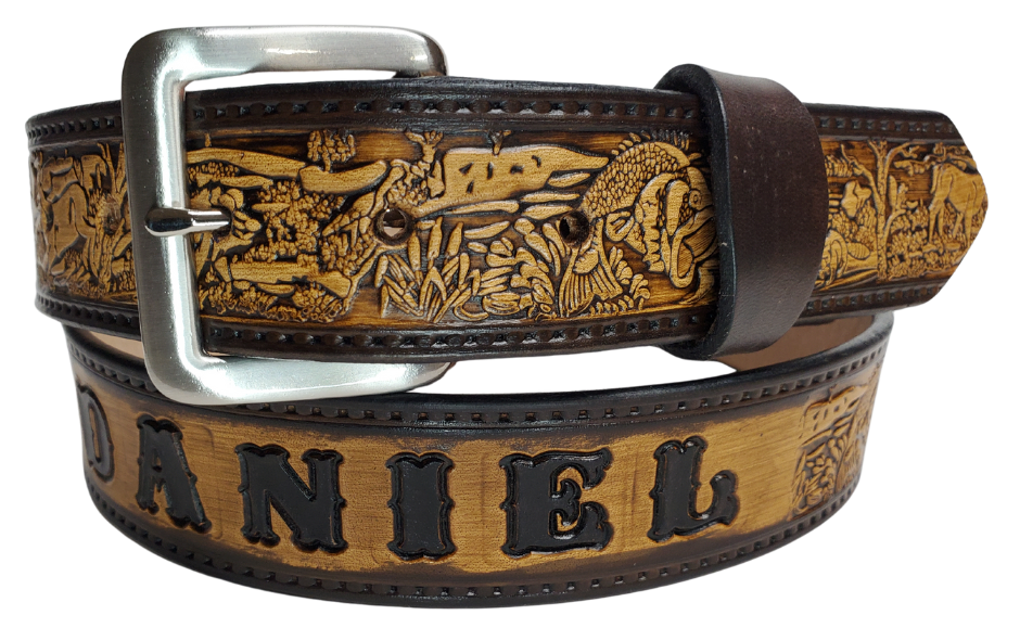 Our Outdoorsman leather belt is crafted from high-quality Veg Tan cowhide and comes in four different color options. The edges are smooth and hand finished. It has Deer, Hogs, Fish, look closely for a Racoon and a Squirrel too. Personalize your belt by adding up to 10 letters. It's 1 1/2" wide, and available in sizes 34" to 44".  The removable Brushed Nickel plated solid brass buckle is attached with two snaps. Handmade in our Smyrna, TN, USA shop, just a short trip from Nashville.
