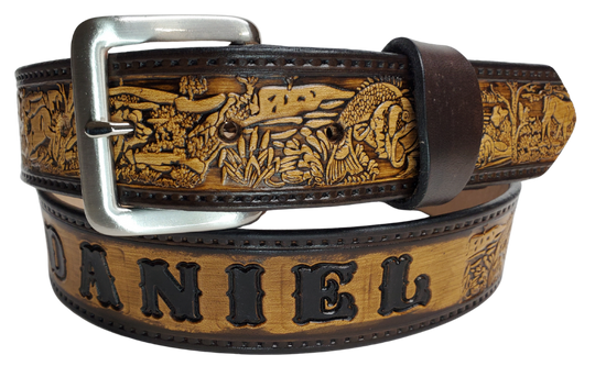 Our Outdoorsman leather belt is crafted from high-quality Veg Tan cowhide and comes in four different color options. The edges are smooth and hand finished. It has Deer, Hogs, Fish, look closely for a Racoon and a Squirrel too. Personalize your belt by adding up to 10 letters. It's 1 1/2" wide, and available in sizes 34" to 44".  The removable Brushed Nickel plated solid brass buckle is attached with two snaps. Handmade in our Smyrna, TN, USA shop, just a short trip from Nashville.