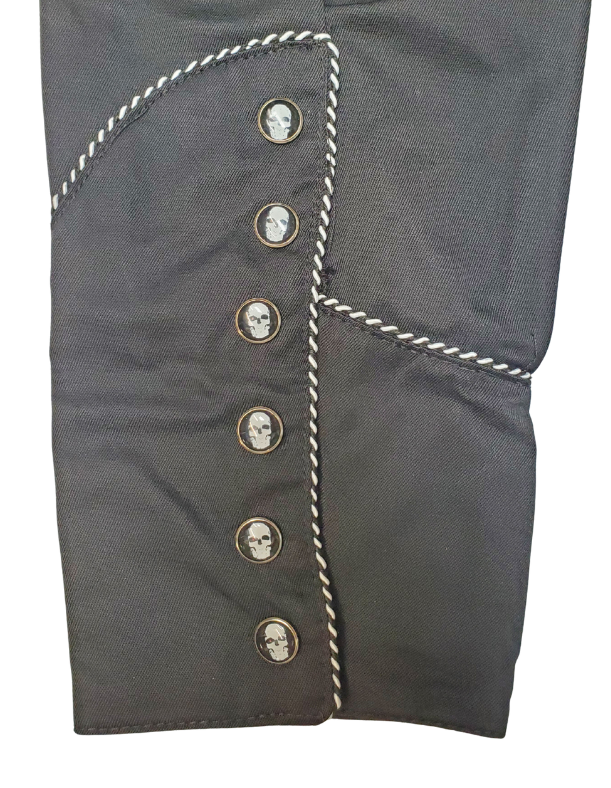 Sleeve view - Western shirts with Skulls & Roses never go out of style! Inspired by classic cowboy movies, these timeless designs are favorites of today’s country stars and rock icons alike. Pair them with your favorite ripped jeans for a casual vibe or dress them up with sharp jeans for a night out. Just arrived at our Smyrna, TN shop, just a stone’s throw from Music Row in downtown Nashville!