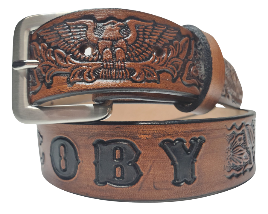 Our Patriot" Name Leather Belt is Full grain American vegetable tanned cowhide approx. 1/8"thick. Width 1 1/2" and includes Antique Nickle plated Solid Brass buckle. Hand Finished with Smooth burnished painted edges. Choose with or without name, if without name, design will cover entire length of belt. For name Type name desired on belt in "Type Name Here" section, no more than 10 letters maximum. Buckle snaps in place for easy changing if desired. Made in our Smyrna, TN, USA shop.
