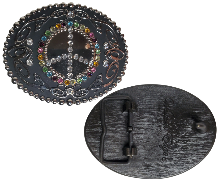 This eye-catching, multifaceted rhinestone peace sign This belt buckle adds a unique flair to any ensemble. Crafted with multicolored rhinestones, this buckle displays a classic peace sign, and is designed to fit a 1 1/2" belt. Measuring 3-1/2" x 2-3/4", this piece is perfect for those looking to add a little pizzazz to an outfit. Located in our Smyrna, TN shop near Nashville, it makes a great addition to any wardrobe.    