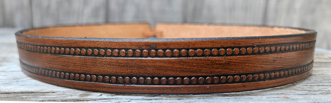 Our Pecos Western Styled Hatband is Hand Stained is 1" in width. It will up to up to size 7 1/2 hat. Fit&