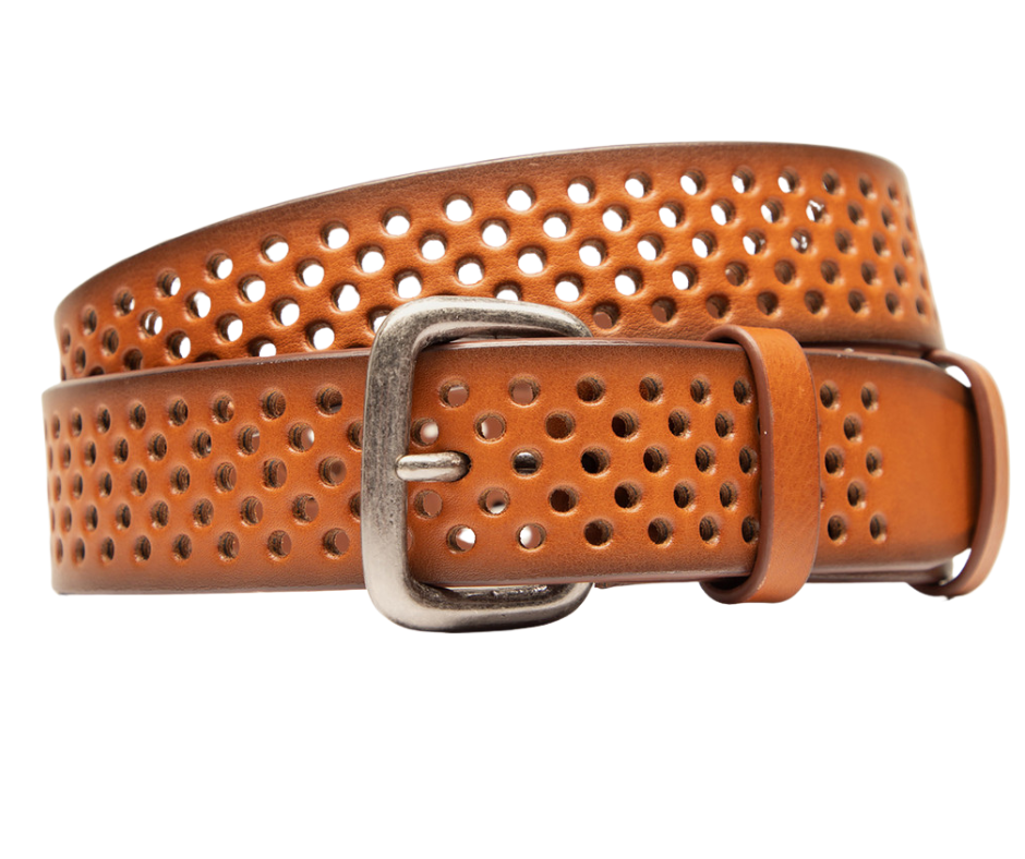 The Perforated Jean Belt - the perfect accessory to complete your outfit with style and functionality. Crafted with high-quality full-grain vegetable-tanned leather imported from Italy and crafted in Turkey,&nbsp; The steel molded hardware with an antique finish adds a touch with its adjustable fit and breathable design, the Perforated Jean Belt is suitable for all seasons. Get fitted at our Smyrna, TN shop not far from Franklin. Made by Will Leather.