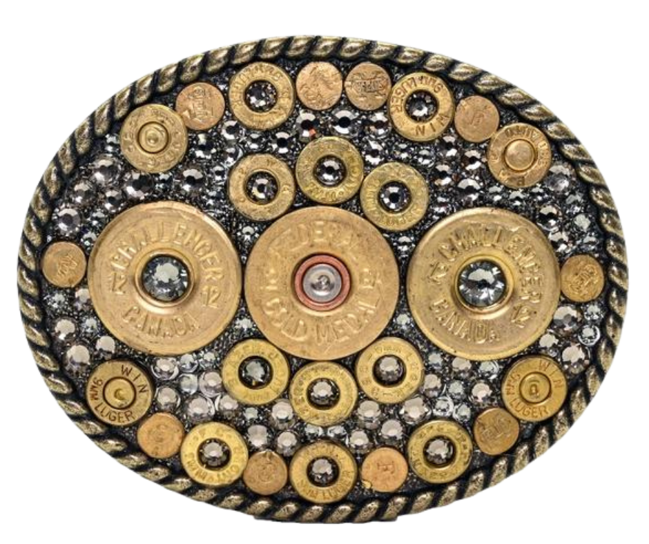 Be bold, break through barriers, and blaze the trail! Women of the west left a powerful mark. Sparkling glamour abounds from this unique oval buckle. Genuine once fired bullets and Swarovski crystals combine for a 3 1/2" x 2 3/4" masterpiece! Fit's up to 1 1/2" belt. Shop now at our Smyrna, TN location near Nashville! Assembled in the USA.