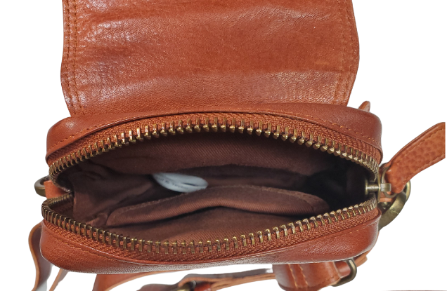 The Jackie Crossbody Purse is the perfect companion for carrying just the essentials - phone, driver's license, and debit card. With an adjustable strap, 2 external zippered pockets, and inner card slots, this bag is both functional and convenient. Available now at our store in Smyrna, TN! Choose from 3 colors.