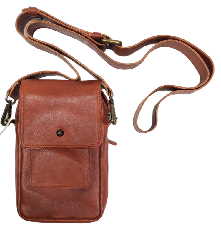 The Jackie Crossbody Purse is the perfect companion for carrying just the essentials - phone, driver's license, and debit card. With an adjustable strap, 2 external zippered pockets, and inner card slots, this bag is both functional and convenient. Available now at our store in Smyrna, TN! Choose from 3 colors.