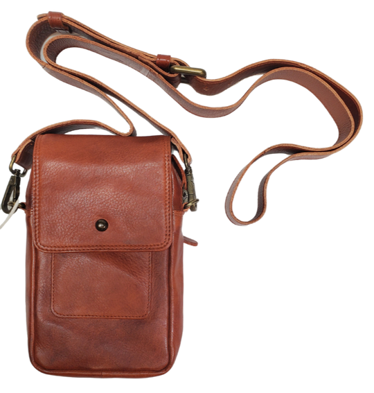 The Jackie Crossbody Purse is the perfect companion for carrying just the essentials - phone, driver's license, and debit card. With an adjustable strap, 2 external zippered pockets, and inner card slots, this bag is both functional and convenient. Available now at our store in Smyrna, TN! Choose from 3 colors.