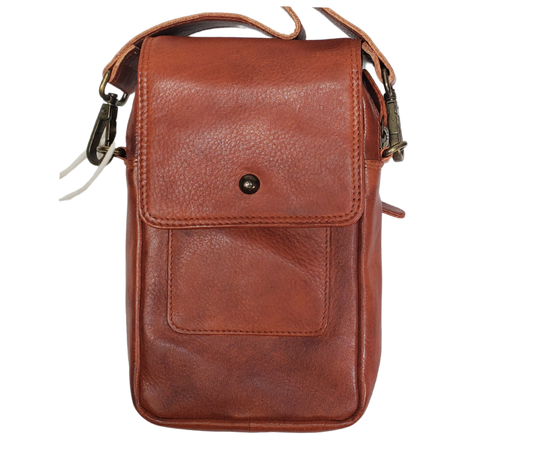 The Jackie Crossbody Purse is the perfect companion for carrying just the essentials - phone, driver's license, and debit card. With an adjustable strap, 2 external zippered pockets, and inner card slots, this bag is both functional and convenient. Available now at our store in Smyrna, TN! Choose from 3 colors.