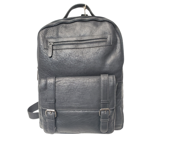 The Educator, a sturdy Leather backpack is available at our Smyrna, TN shop not far from Nashville. It has one front zip pocket, a front pouch that closes by a flap with clasps
accented with decorative adjustable straps. A forward main compartment that zips closed and contains a narrow inside open pocket for glasses, pencils, or phone, and is topped with a leather handle.