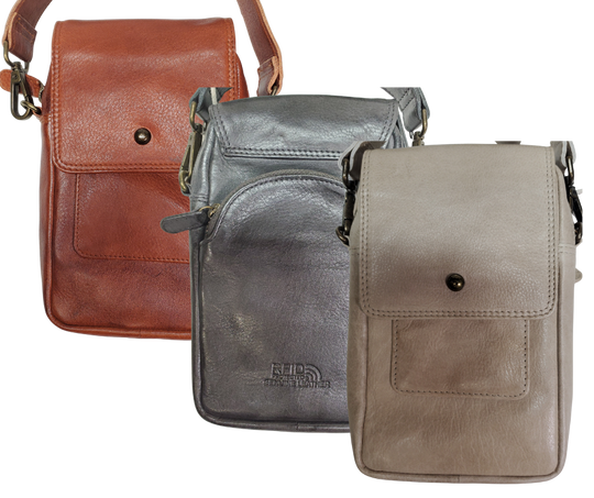 The Jackie Crossbody Purse is the perfect companion for carrying just the essentials - phone, driver's license, and debit card. With an adjustable strap, 2 external zippered pockets, and inner card slots, this bag is both functional and convenient. Available now at our store in Smyrna, TN! Choose from 3 colors.
