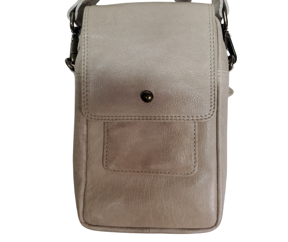The Jackie Crossbody Purse is the perfect companion for carrying just the essentials - phone, driver's license, and debit card. With an adjustable strap, 2 external zippered pockets, and inner card slots, this bag is both functional and convenient. Available now at our store in Smyrna, TN! Choose from 3 colors.