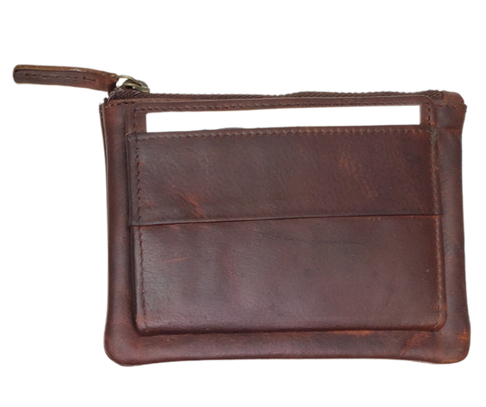 Looking to simplify your life? The "Carter" Coin Pouch Wallet might be just the ticket. It has just the right number of card slots, an ID slot, and a zippered pouch for your little extras and coins. The size is perfect for front pockets, and it even has RFID security. Come visit our shop in Smyrna, TN and put your minimalist skills to the test!